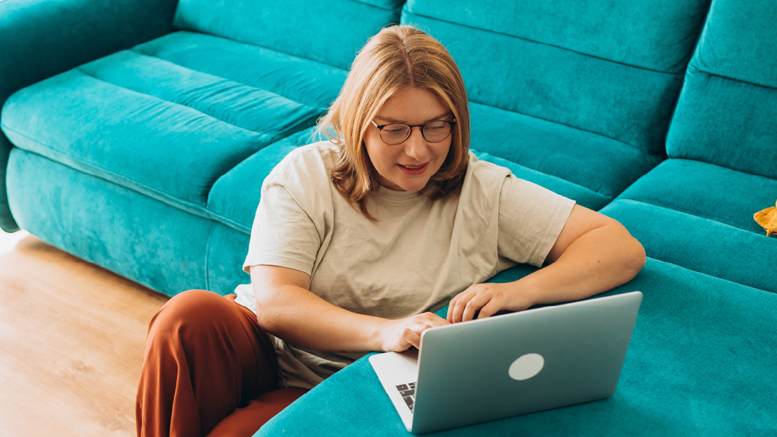 decorative image of a woman at a laptop